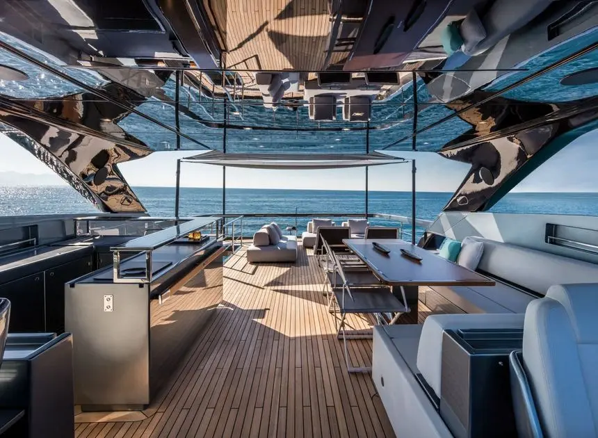 Riva 100 Corsaro flybridge deck with bar beneath mirrored hardtop