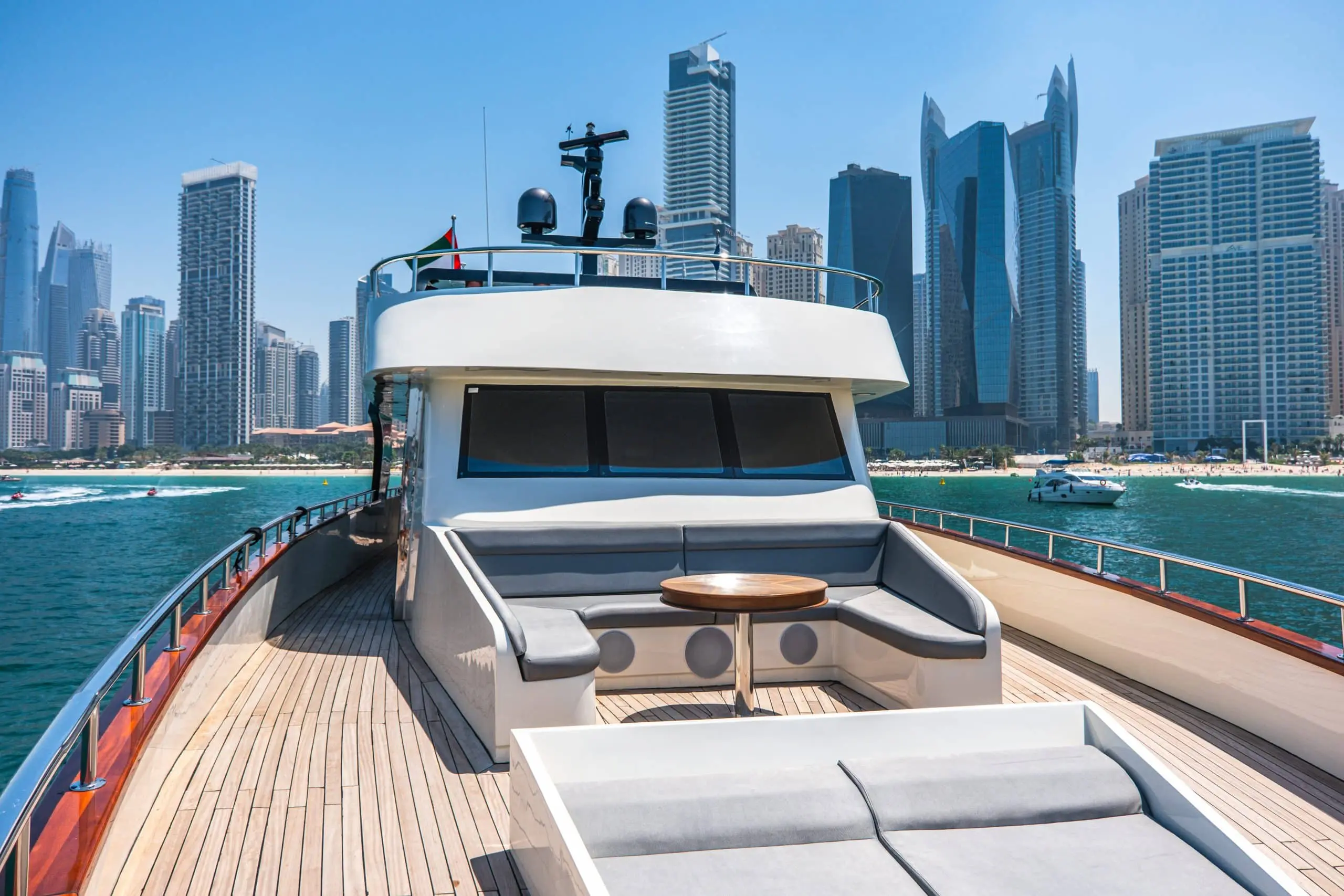 Front deck seating with Dubai skyline view on Sapphire 150 Yacht