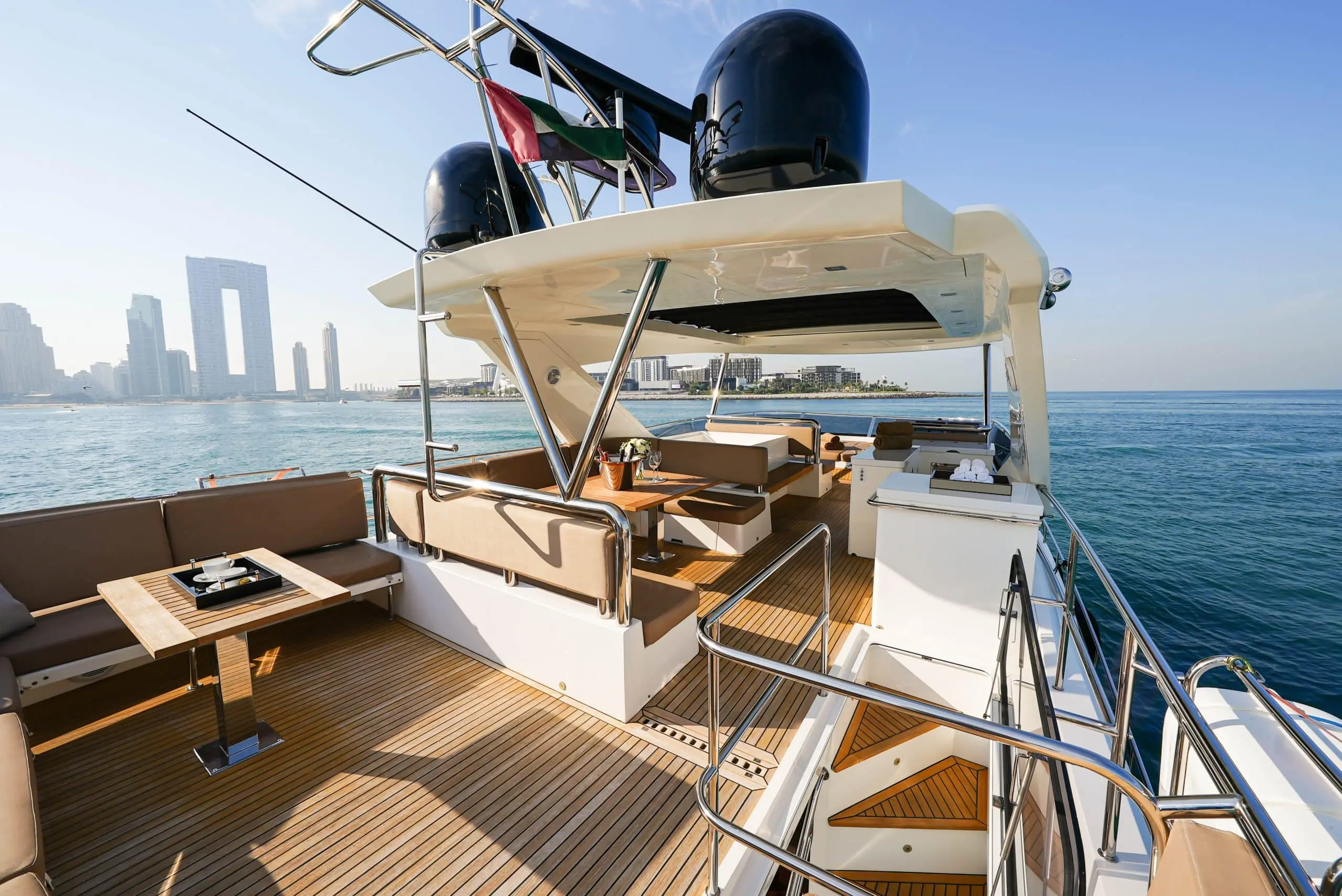 Galeon 780 F1 flybridge lounge with sunshade, seating area, and teak decking