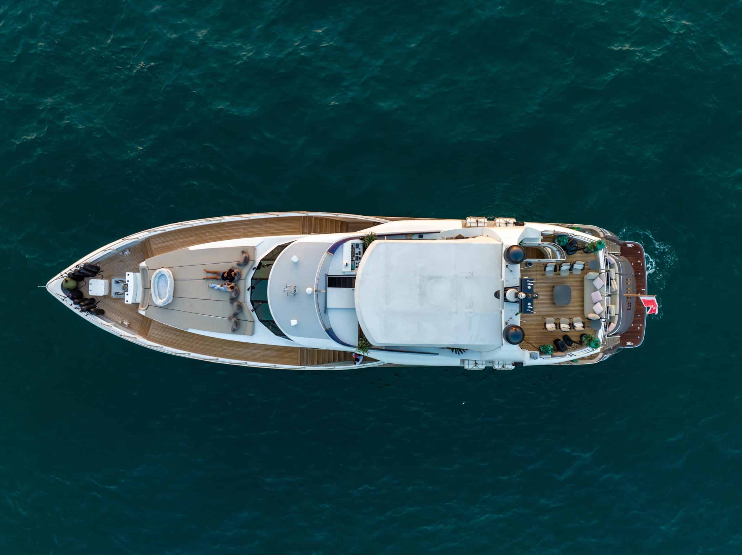 Aerial top view of Tatti 110 luxury yacht on open water