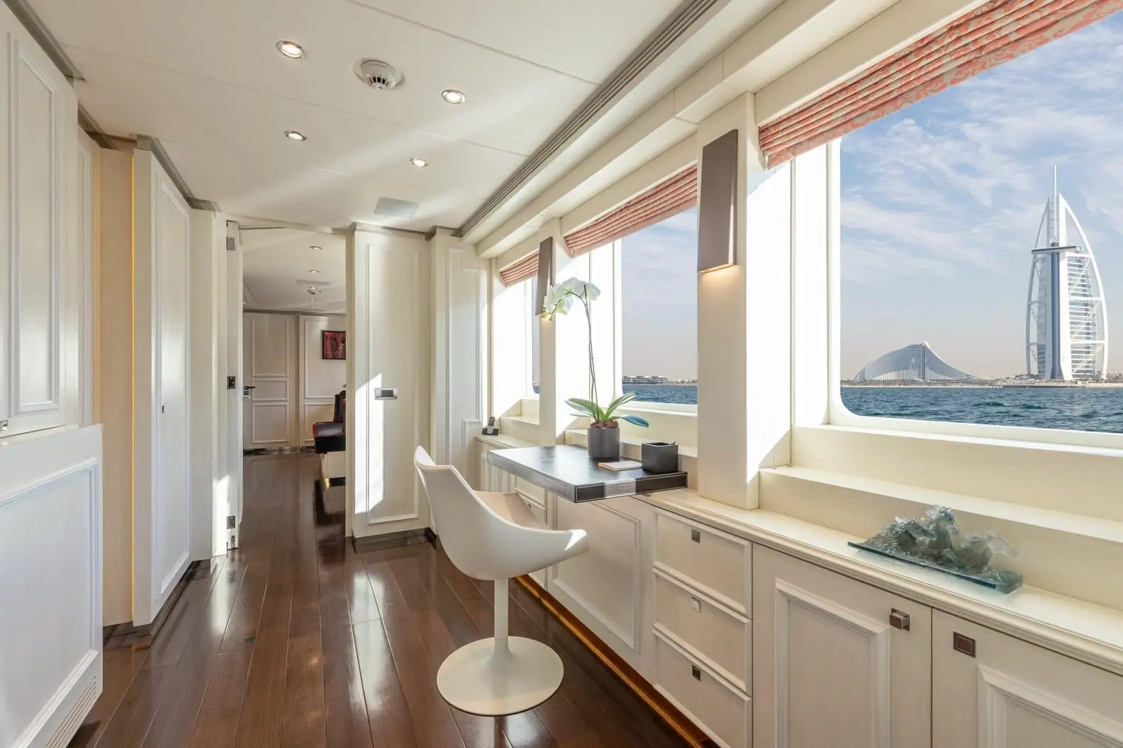 Heesen 5000 master cabin study with Burj Al Arab sea view