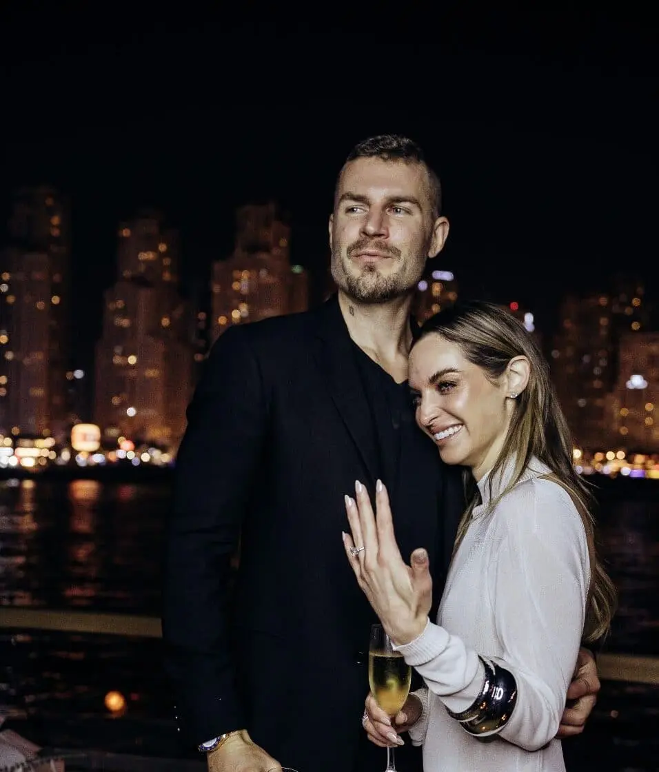 Romantic yacht proposal in Dubai with engagement ring and city lights