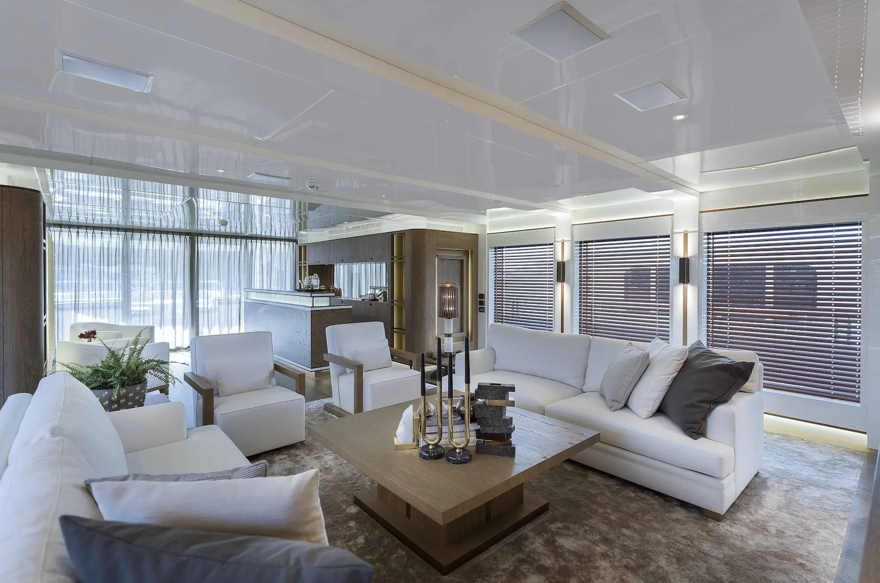 Skyfall 177 yacht main lounge with modern sofas and large windows