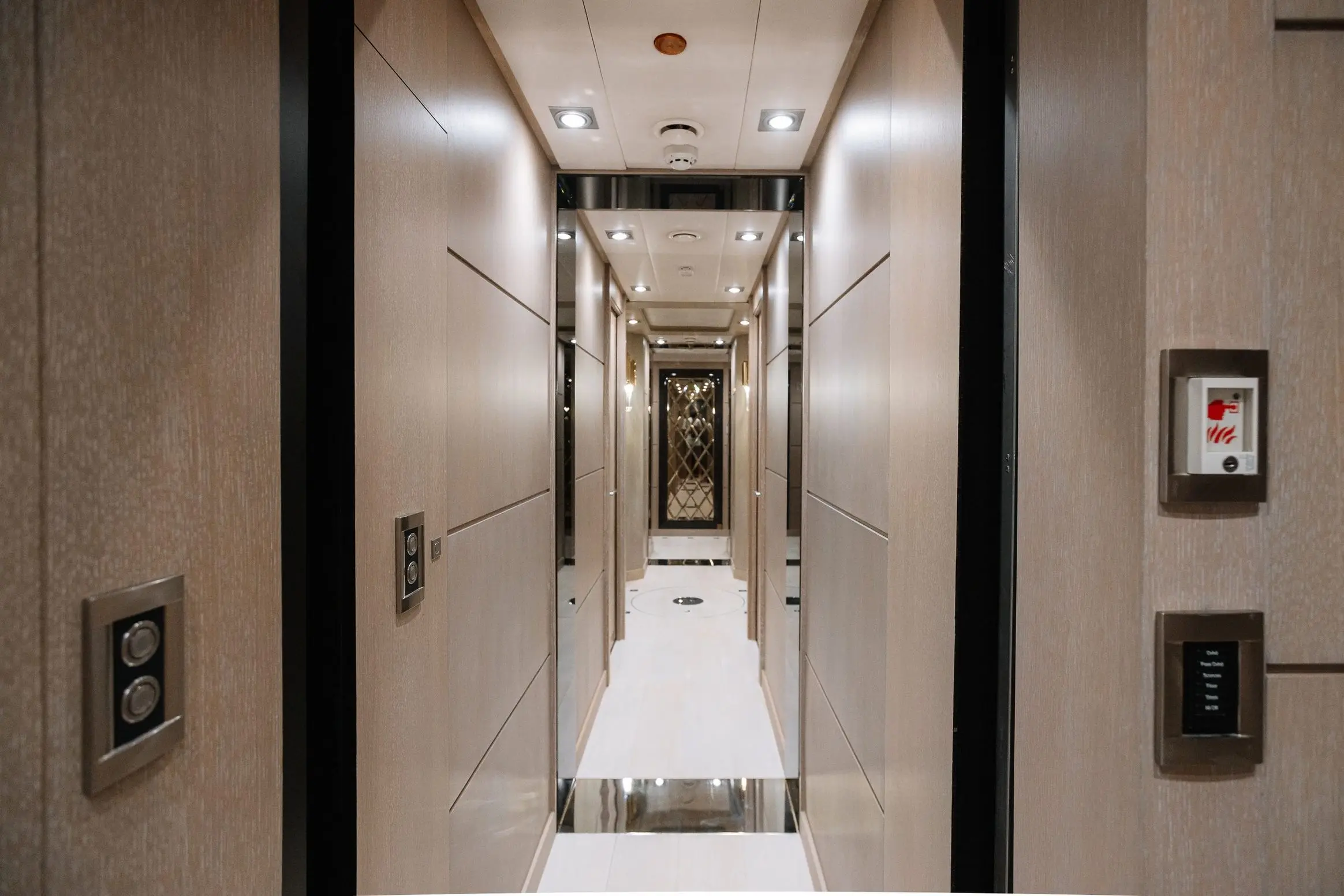 Royalty 136 luxury yacht interior hallway with modern lighting and sleek wall finishes