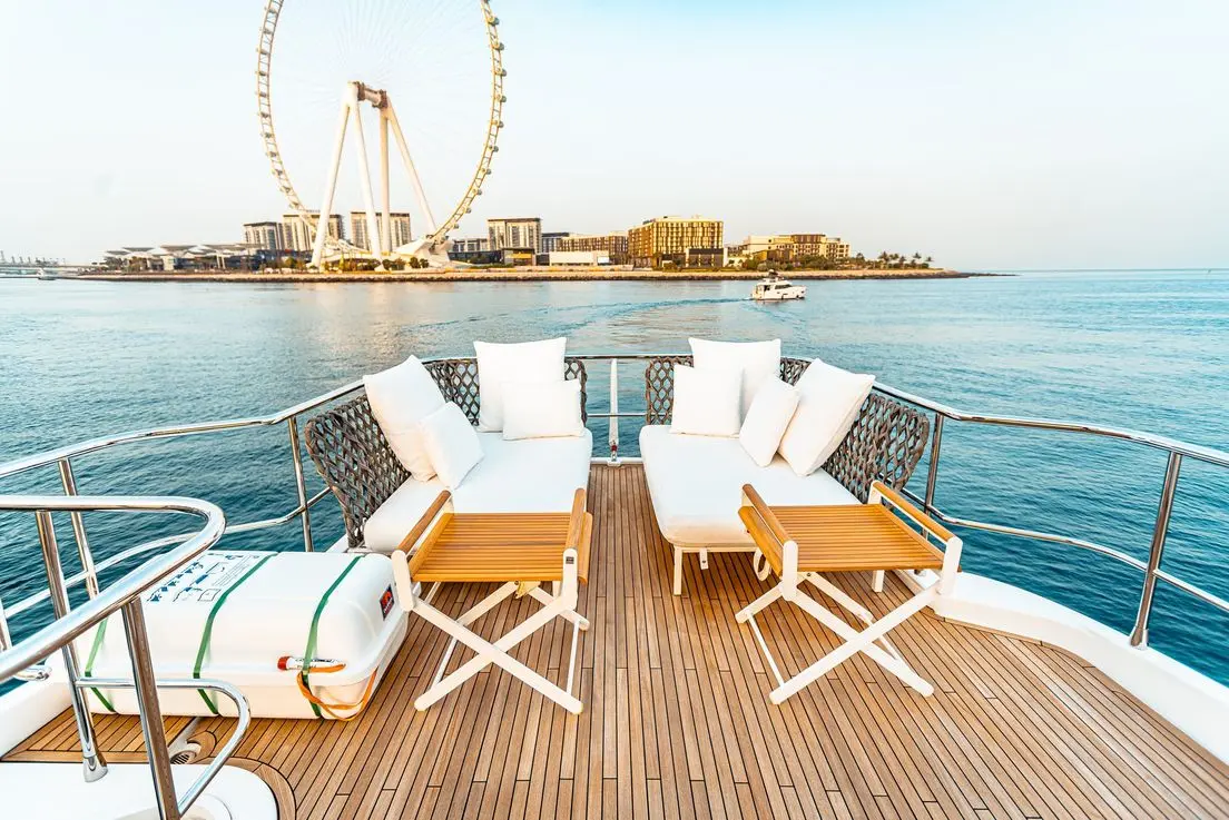 Azimut 70 Migueria yacht outdoor dining space on deck