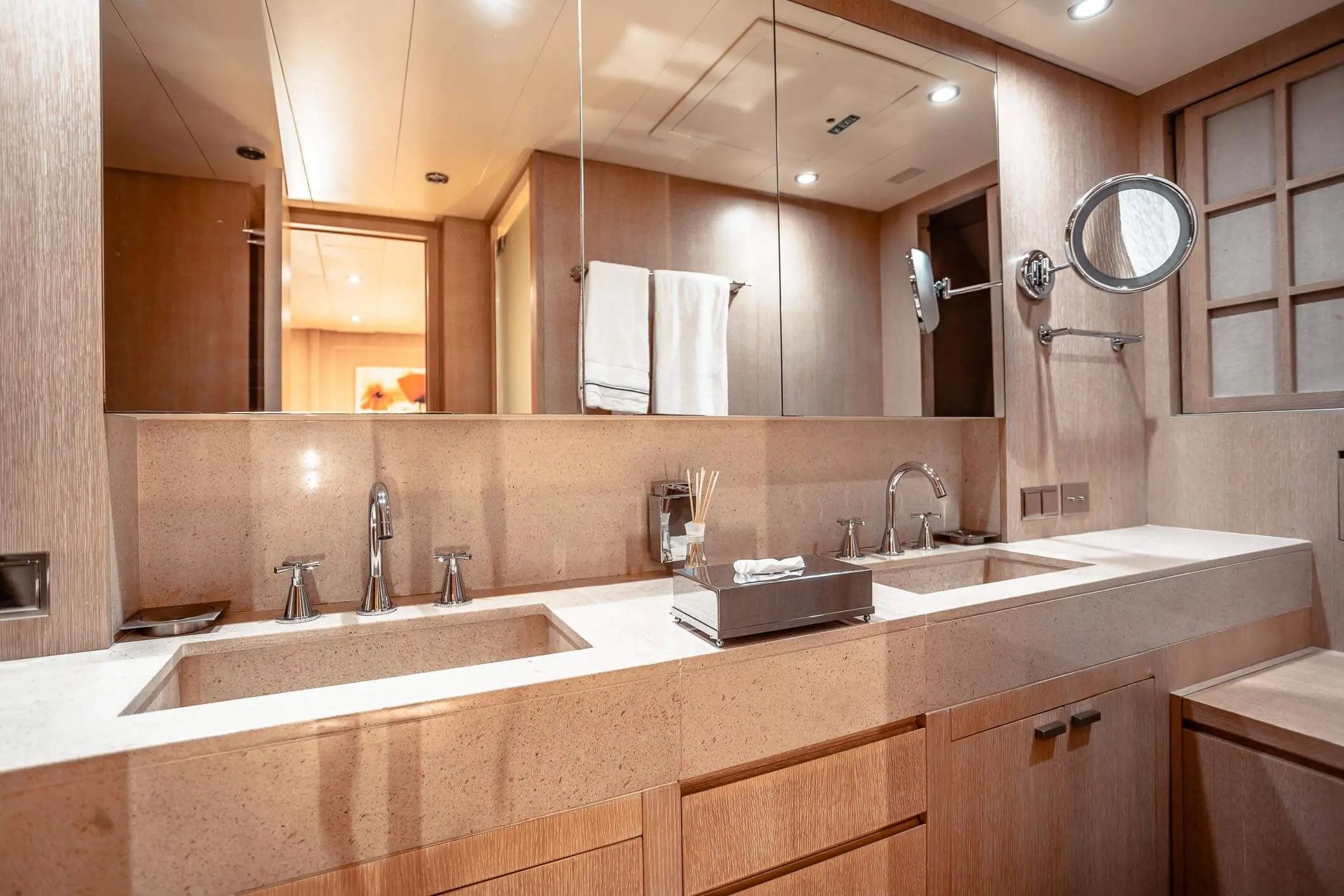 Baglietto 105 HT owner bathroom with twin stone vanities