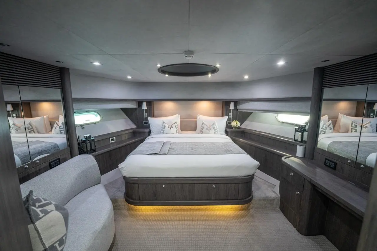 Sunseeker 82 Yacht full-beam master cabin with hull windows