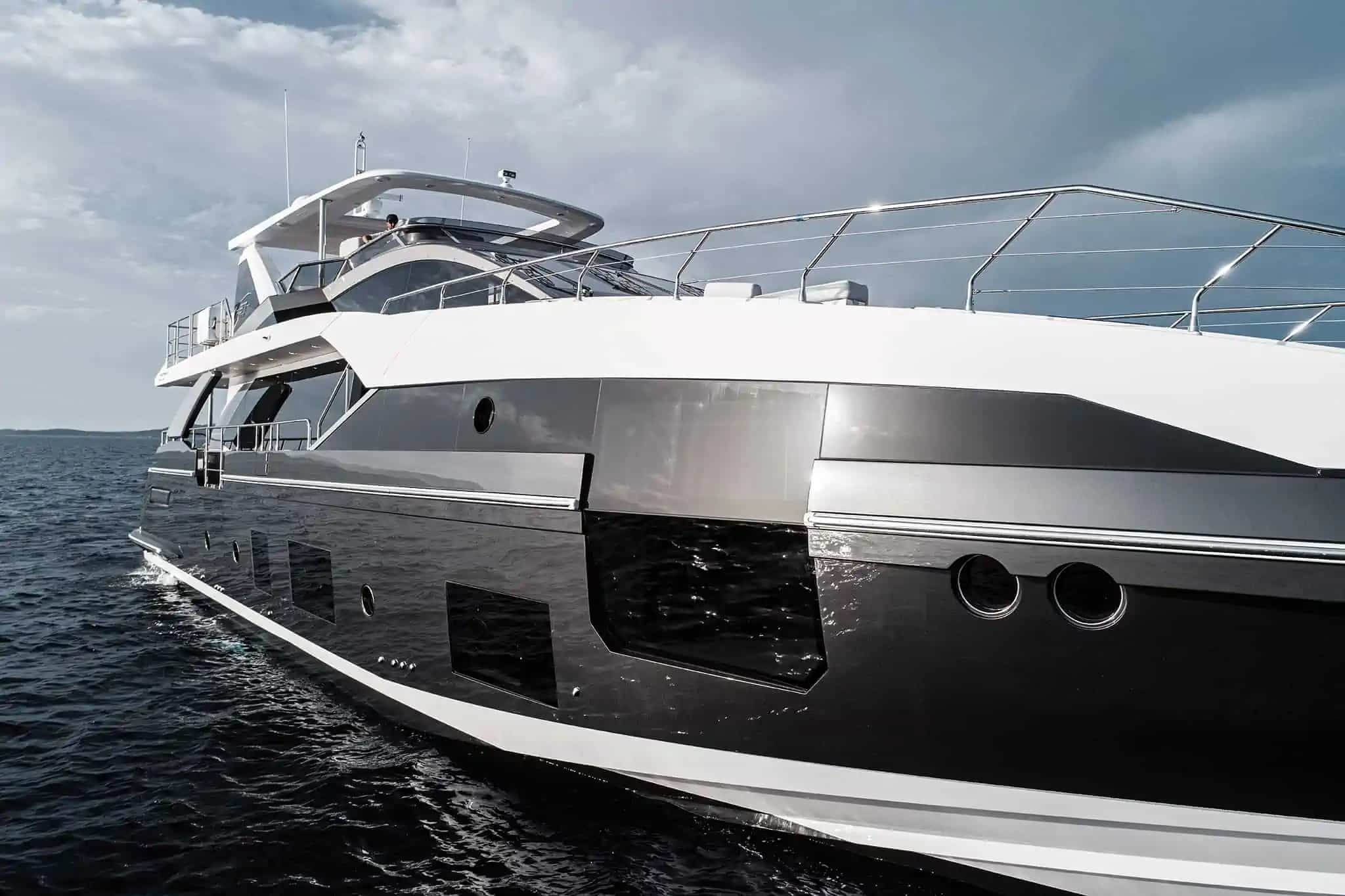Azimut Grande 27M bow quarter view at anchor, shipyard photo