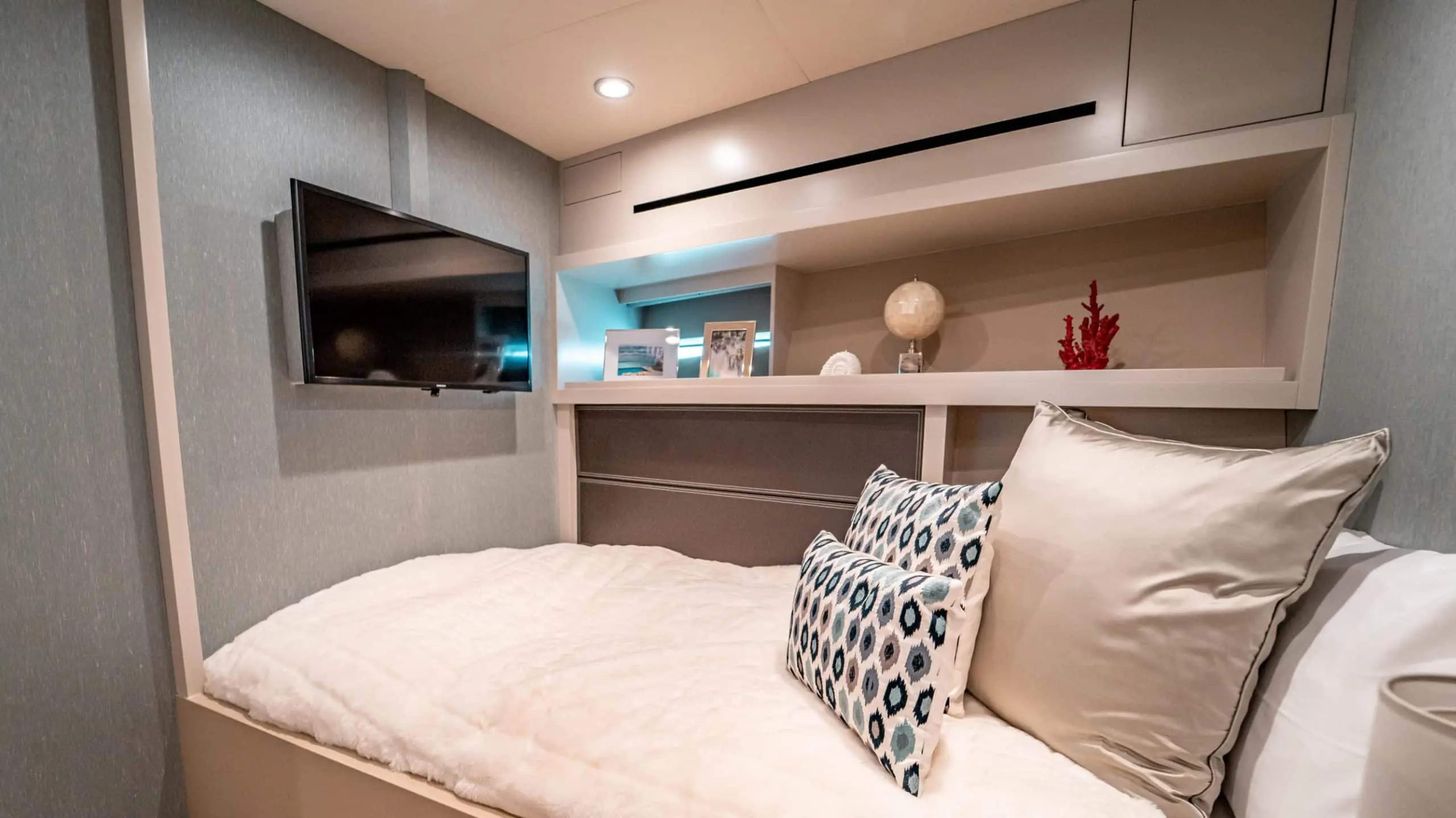 Dolce Vita yacht interior lounge with modern seating and panoramic sea views in Dubai