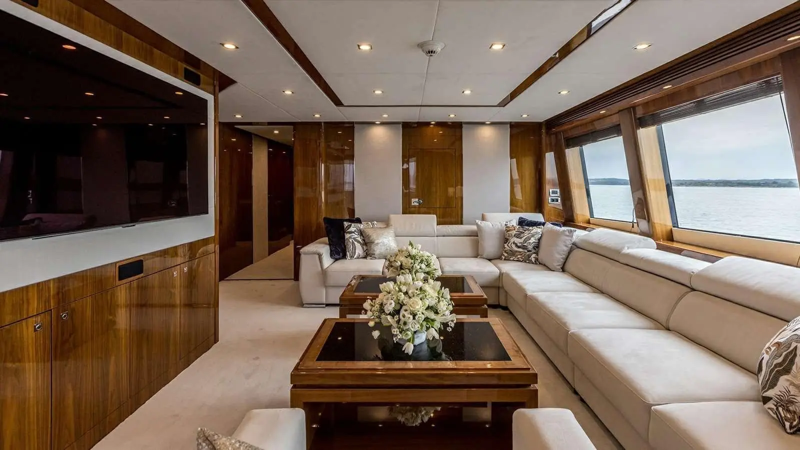 Sunseeker 37M sky lounge with widescreen TV and corner sofas