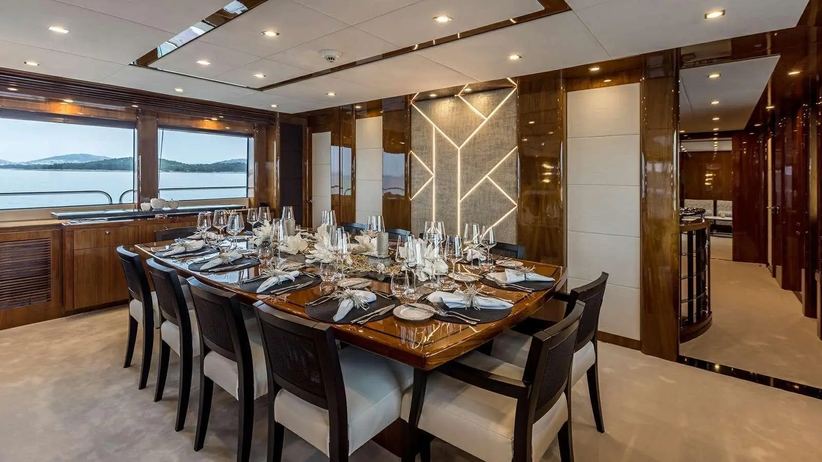 Sunseeker 37M formal dining table set for eight in the saloon