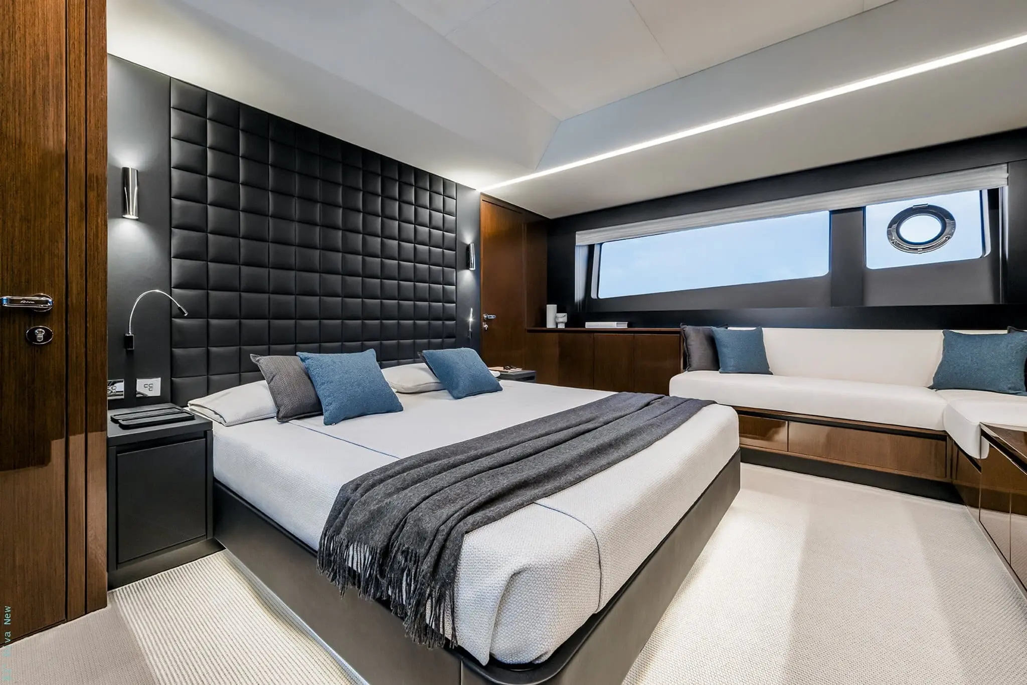 Riva 82 Diva master cabin with padded headboard and hull window