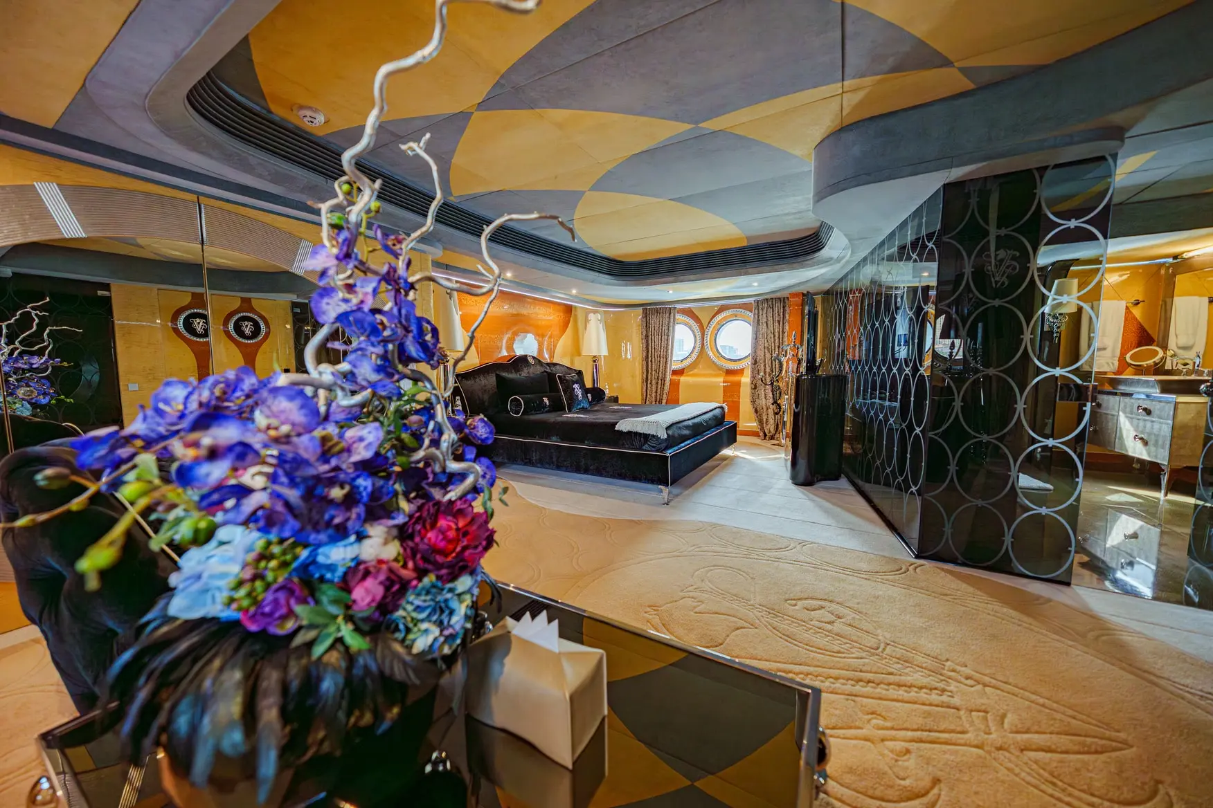 Thunder Superyacht dining area with floral centerpiece and luxury interior
