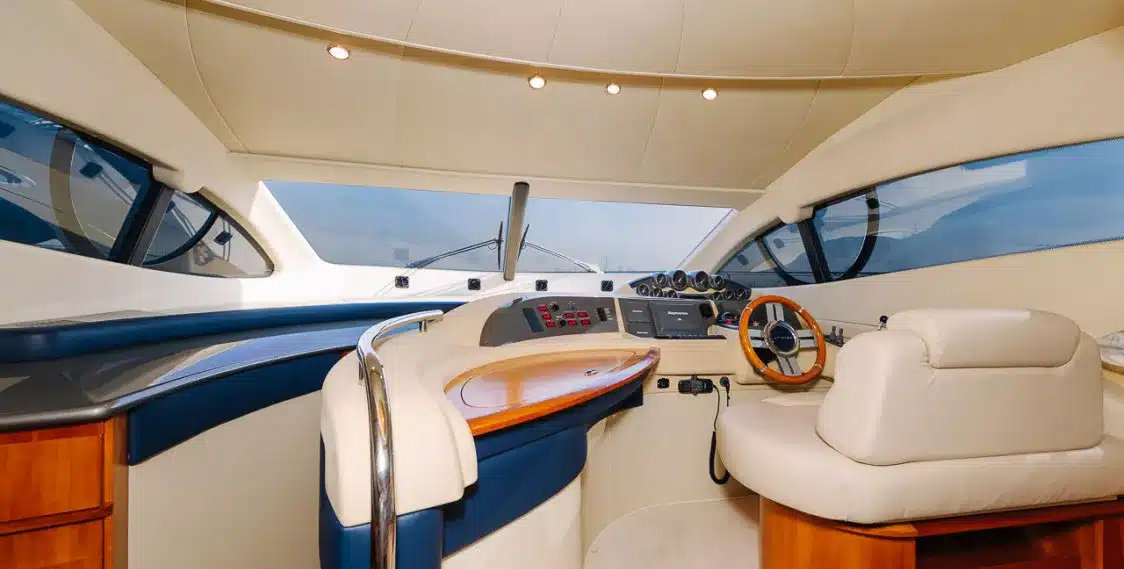 Bliss 55 yacht helm station with steering wheel and control dashboard