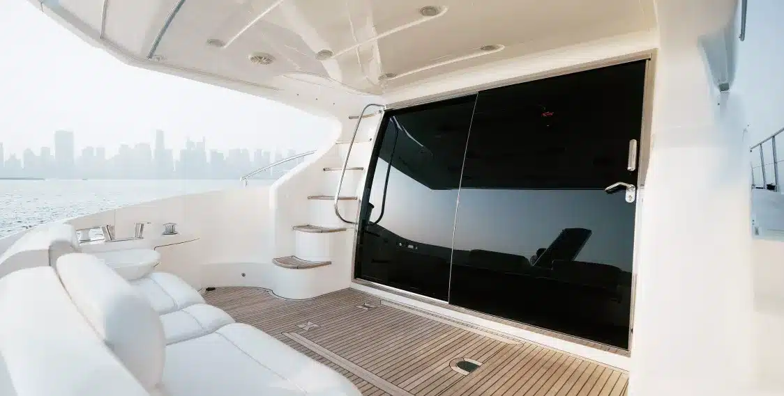 Bliss 55 yacht aft deck seating with teak flooring