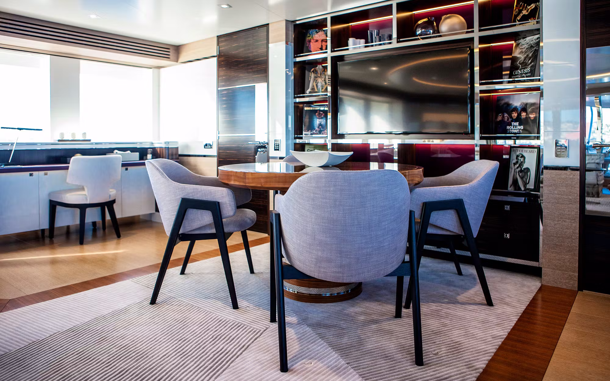 Modern interior dining and seating area on Sofiya 153 yacht