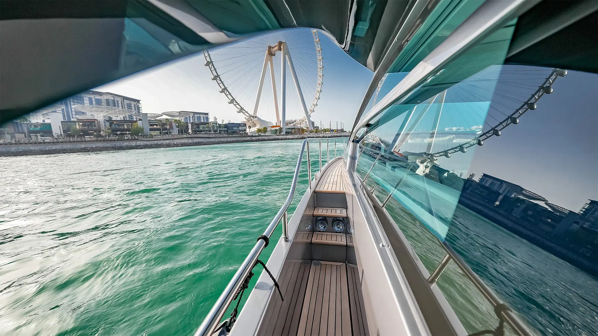 Side deck aboard the Pershing 5X with Ain Dubai in view