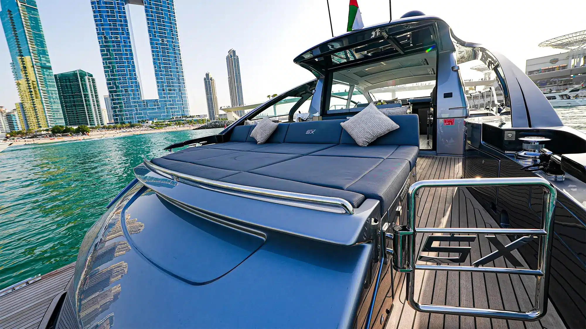 Pershing 5X swim platform and aft sunpad at anchor
