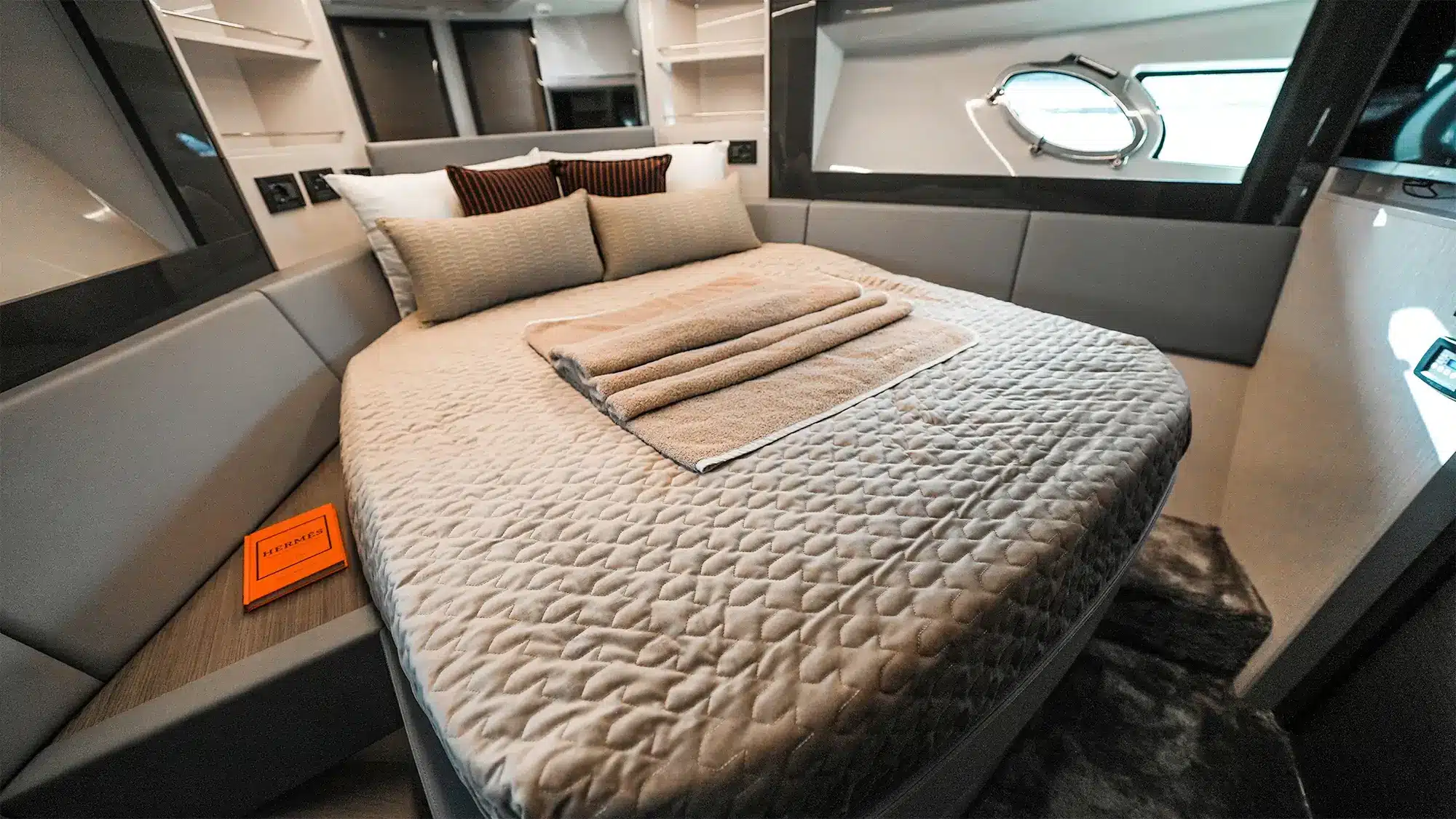 VIP cabin with hull windows aboard the Pershing 5X