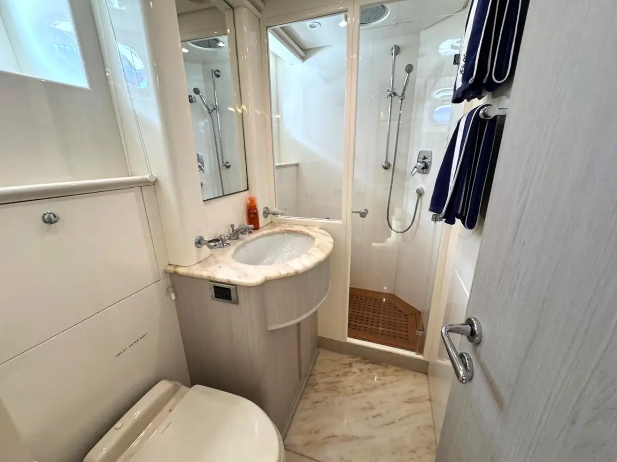 Azimut 100 Jumbo guest bathroom with separate shower stall