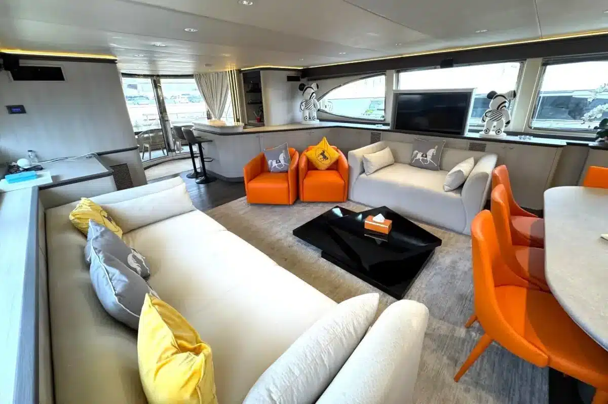 Azimut 100 Jumbo saloon sofas with yellow accent cushions