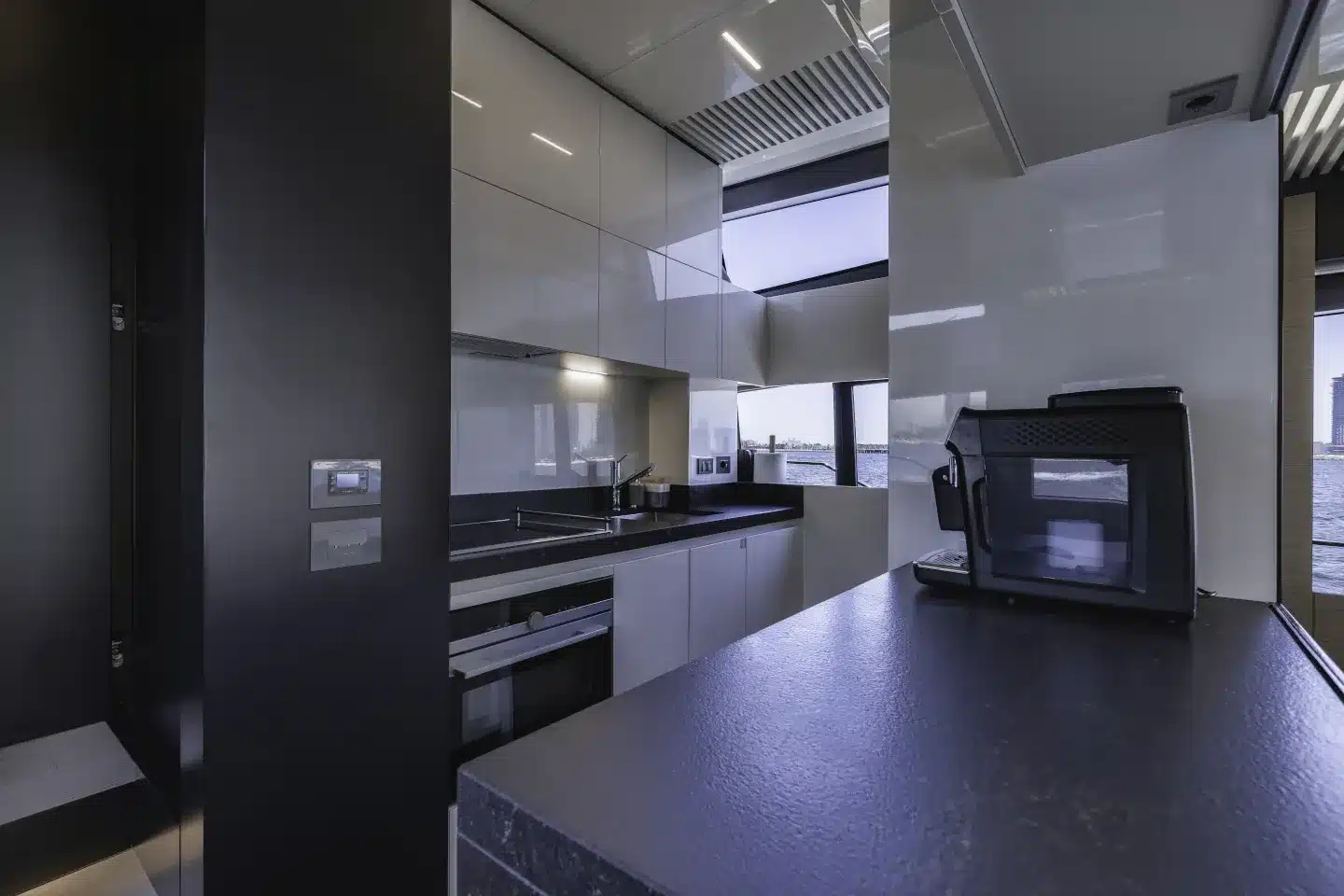 Ferretti 780 galley with stone worktops, oven and integrated appliances