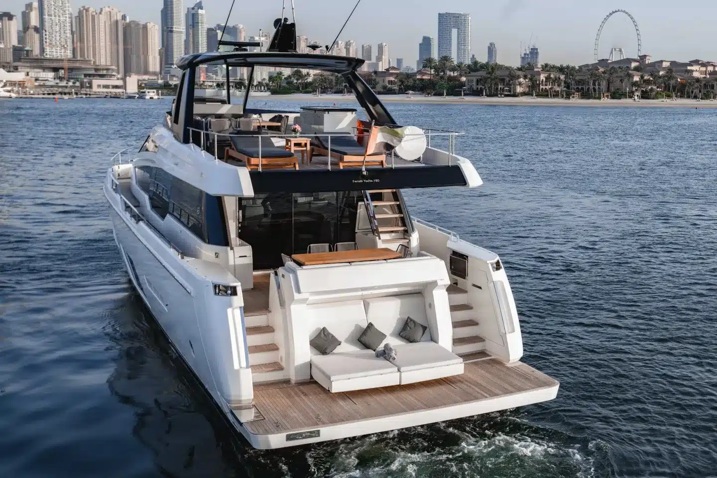 Ferretti 780 stern and swim platform with Ain Dubai behind