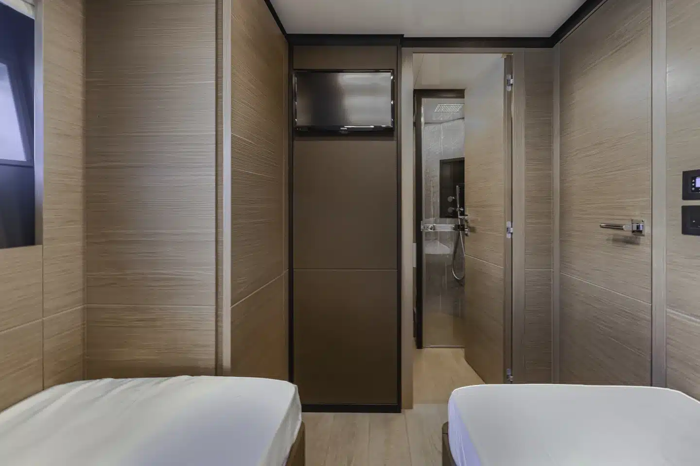 Ferretti 780 twin cabin with side-by-side berths and ensuite door