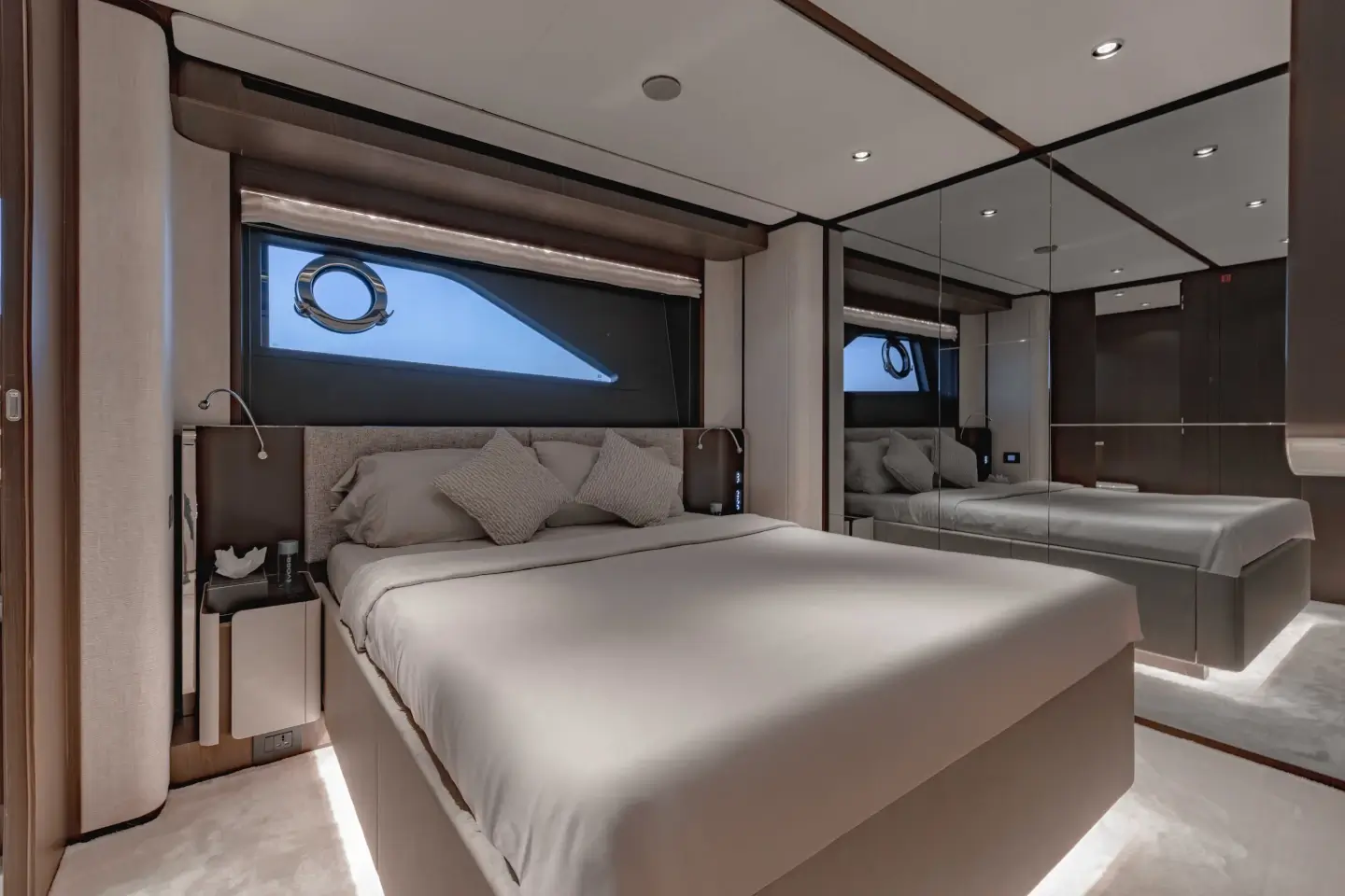 Ferretti 860 guest cabin with double berth and hull window