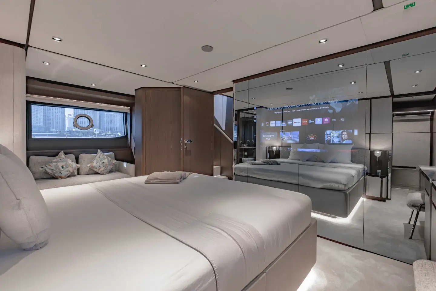 Ferretti 860 master cabin looking toward the television and ensuite