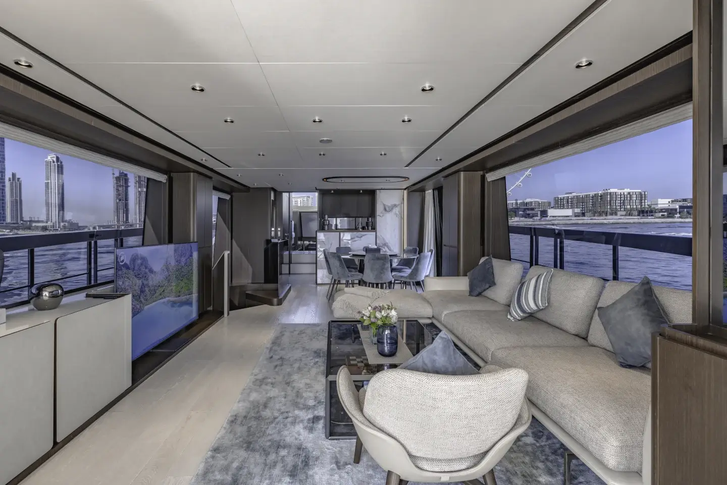 Ferretti 860 saloon lounge looking aft toward the cockpit doors
