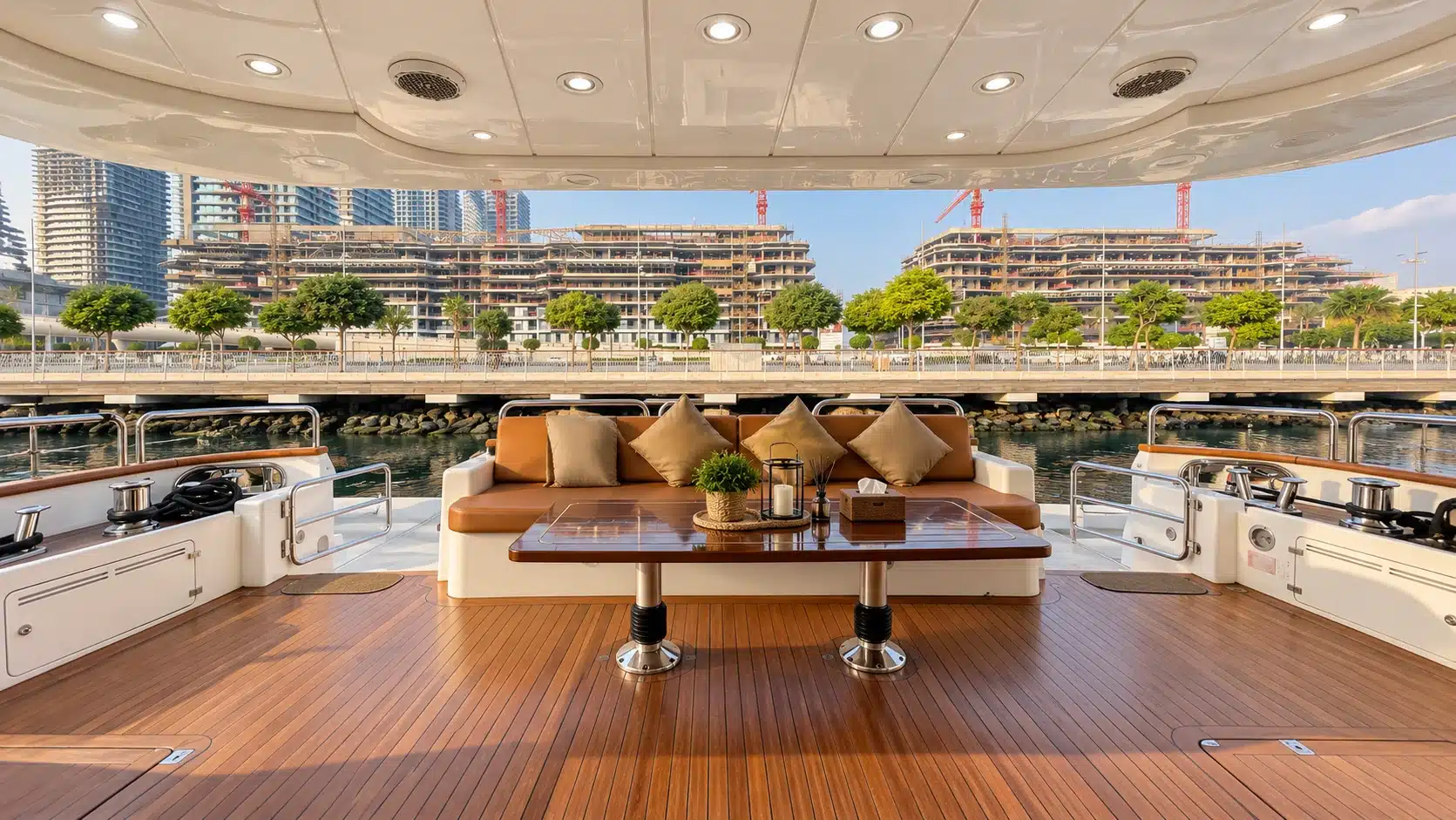 Benetti 120 yacht aft deck seating and teak dining table