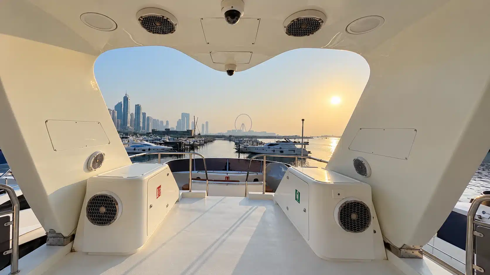 Benetti 120 yacht covered upper deck walkway at sunset