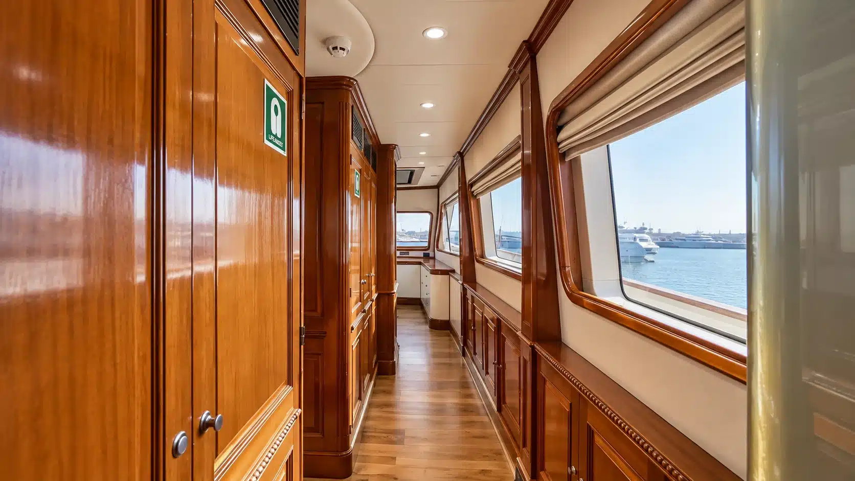 Benetti 120 yacht wood-panelled interior corridor
