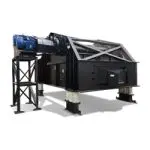 Portable rock crusher with conveyor feeder and blue motor, mounted on a metal frame.