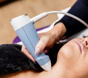 A close-up photo of a provider administering a non-surgical face lift in Columbus, OH.