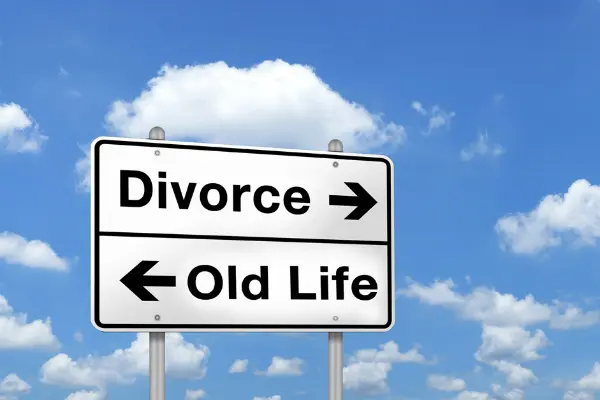 sign with "divorce" and "old life" in opposite directions signaling divorce process