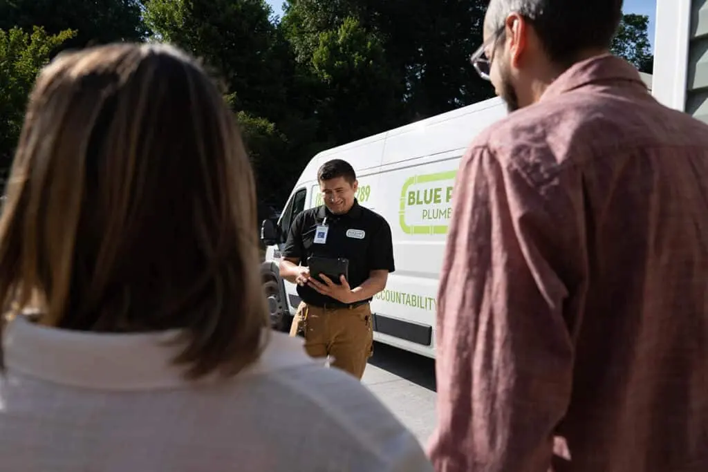 Pablo from Blue Planet Home Services, talks with customers