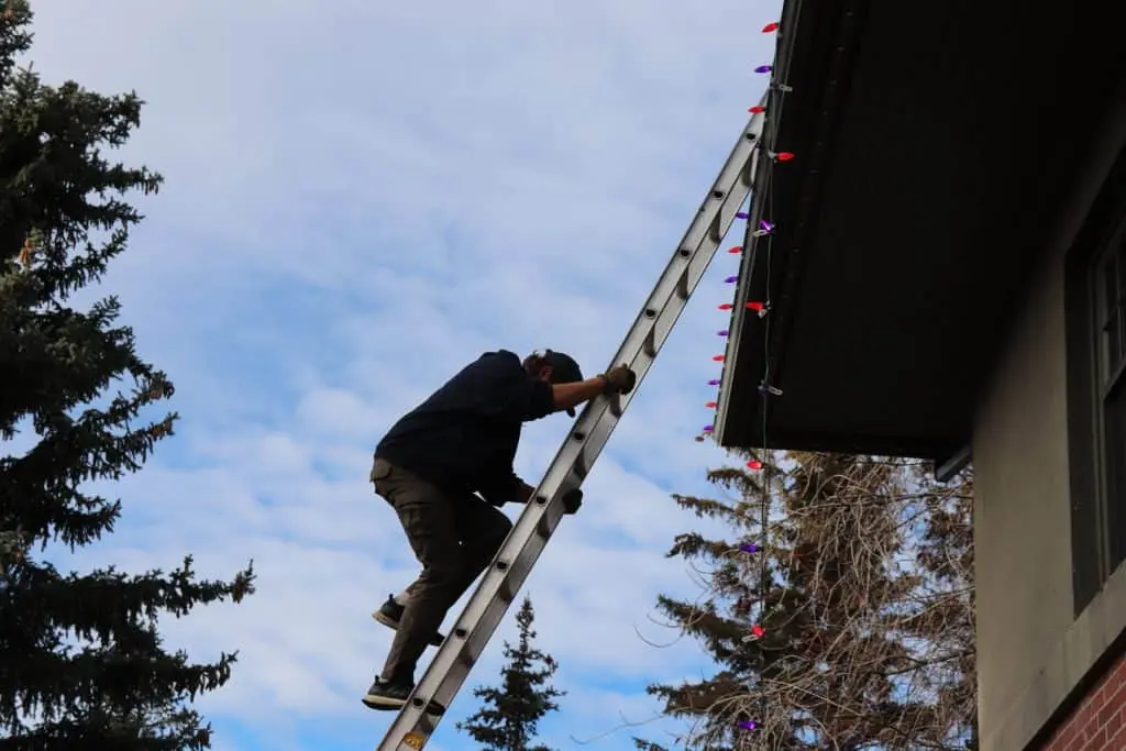 Stay safe installing lights in Anchorage with ladder, roof, and weather strategies that actually work.