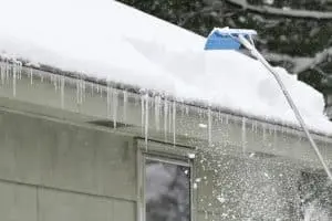 Snow removal service in Anchorage: Roof Rake Safety and Ice Dam Prevention