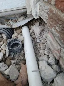 Basement drainage system and sump pump components protecting against water damage.