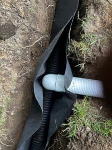 French drain system installation and drainage solution for basement waterproofing in Pittsburgh, Pennsylvania.