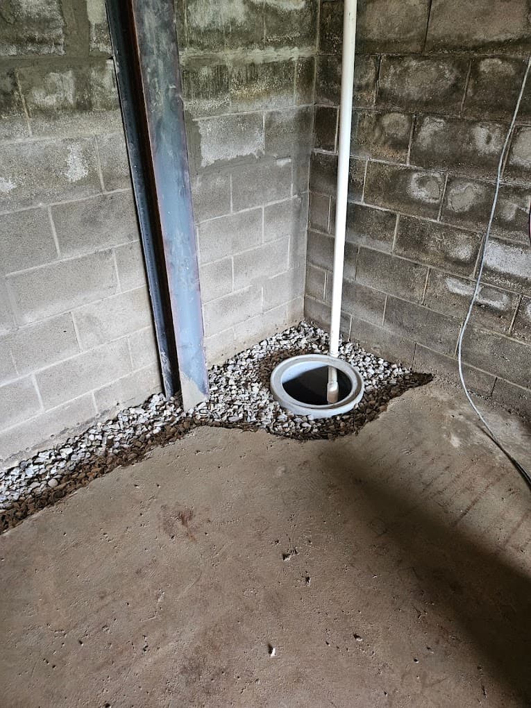 Interior French drain installation in a Buffalo basement
