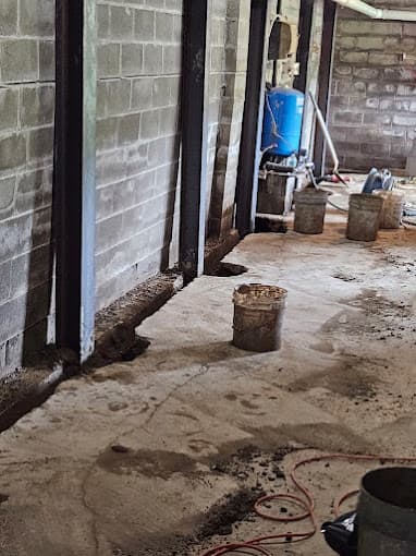 Basement wall bowing and foundation repair solutions, Highlander Waterproofing.