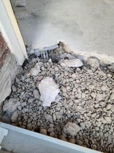Expansive clay soil and hydrostatic pressure damaging foundation, Highlander Waterproofing repair solution.