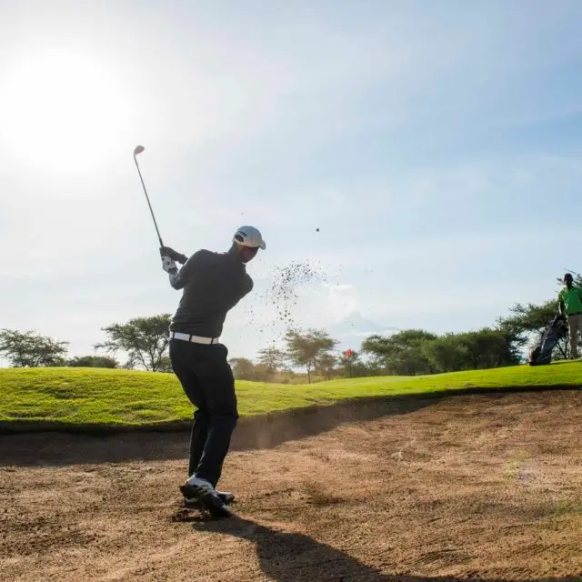 Golfer playing at Kilimanjaro golf course