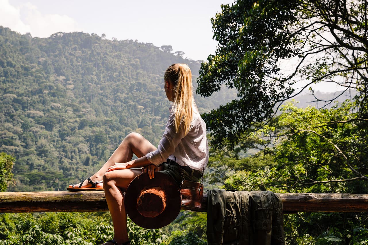 Women look out while gorilla trekking
