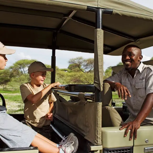 kids on a safari game drive
