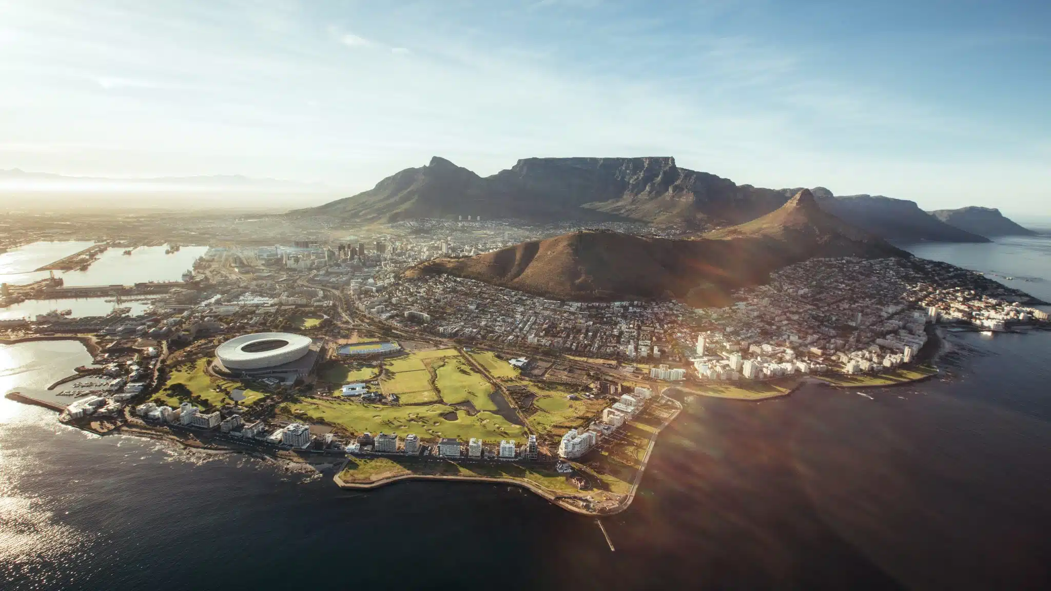 Aerial view of Cape Town, South Africa Aerial view of Cape Town with Cape Town Stadium, Lion's Head and Table mountain.