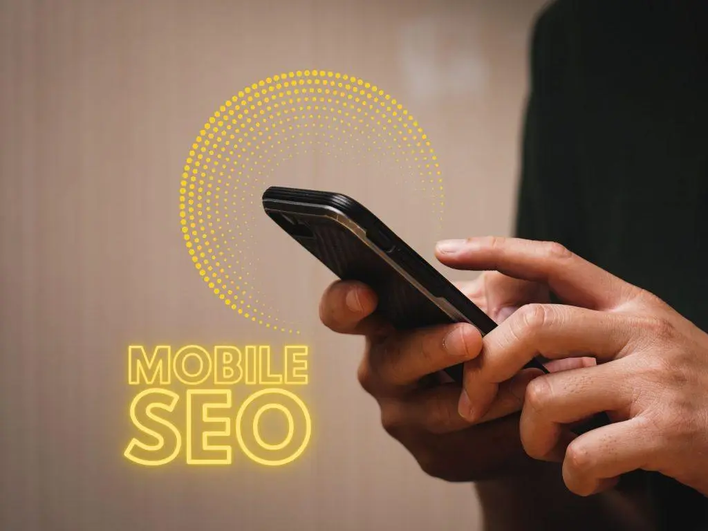 Close up of hands holding a smartphone with the text Mobile SEO and a dotted yellow circle, emphasizing mobile optimization